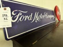 Ford Motor Company sign and Coca Cola sign