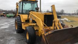 1990 John Deere 710C Loader Backhoe w/ Ext-A-Hoe