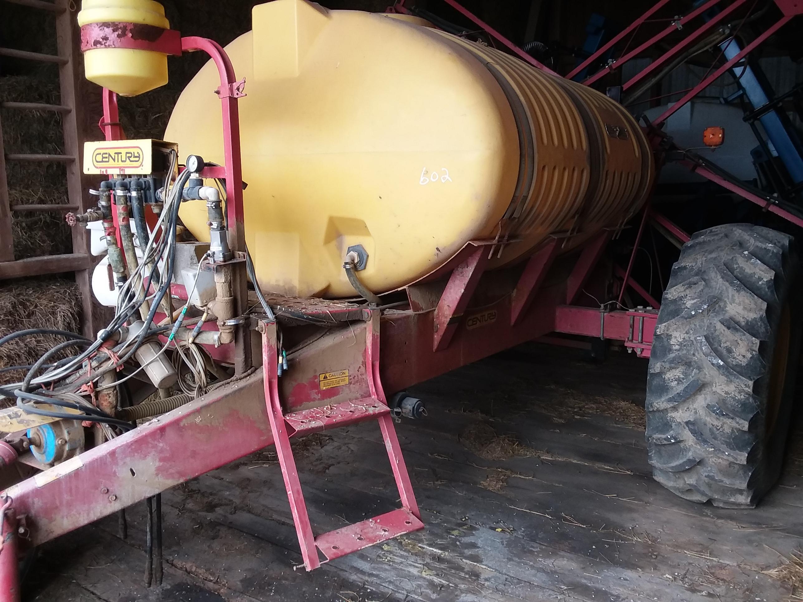 Century trailing sprayer w/1000 gal. tank and 60’ hyd. folding booms, foam markers, and Ravens 440 C