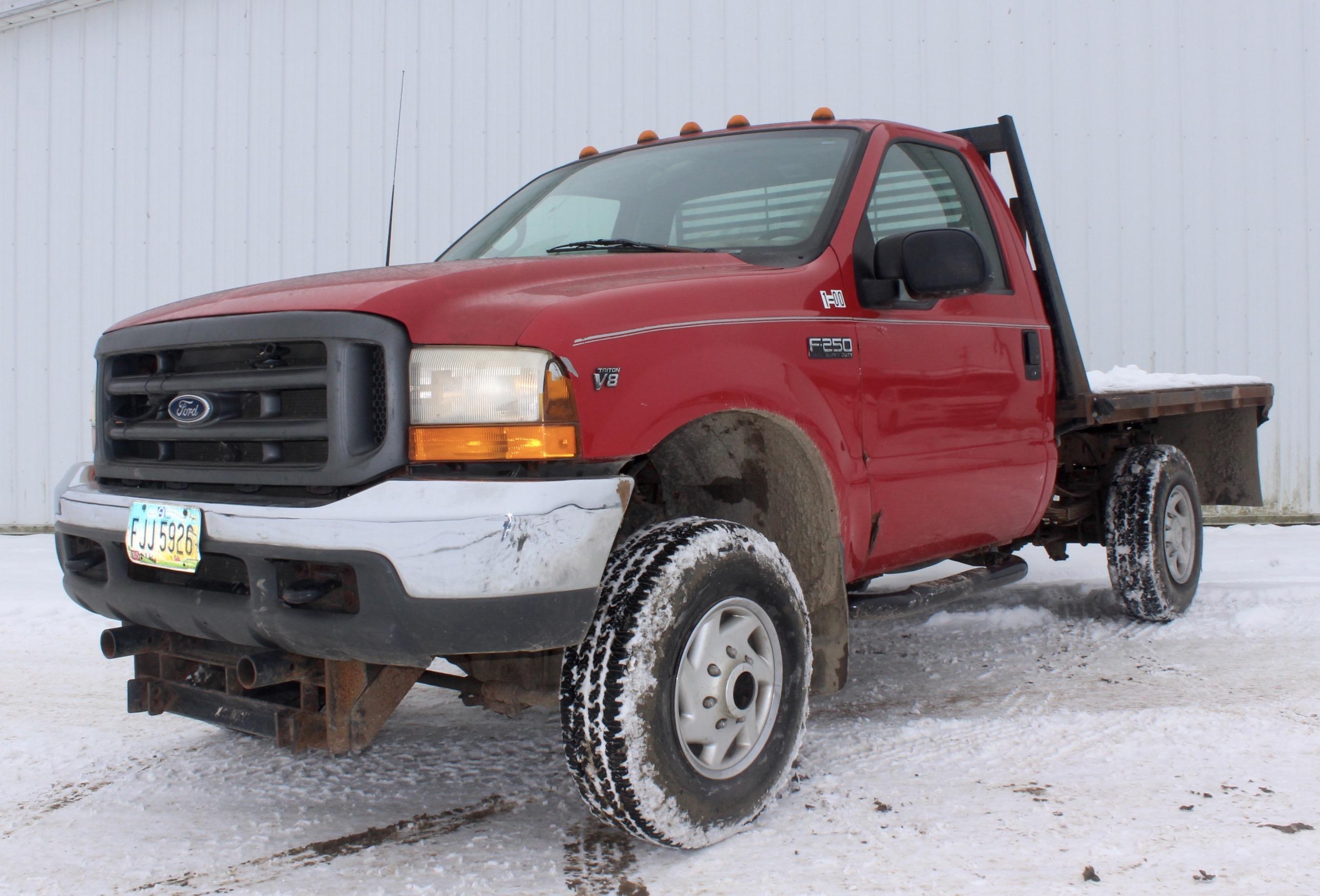 2001 Ford F-250 Red 4x4 pickup w/reg. cab, 5.3L V-8, auto., flatbed, selling w/Meyers snow plow, 85K