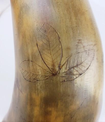 Scrimshaw gun powder horn