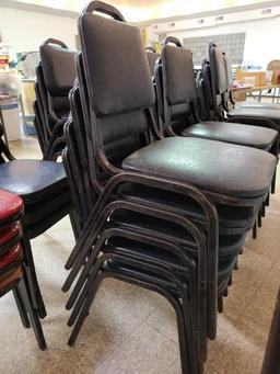 Stacks of Red & Black Restaurant Chairs