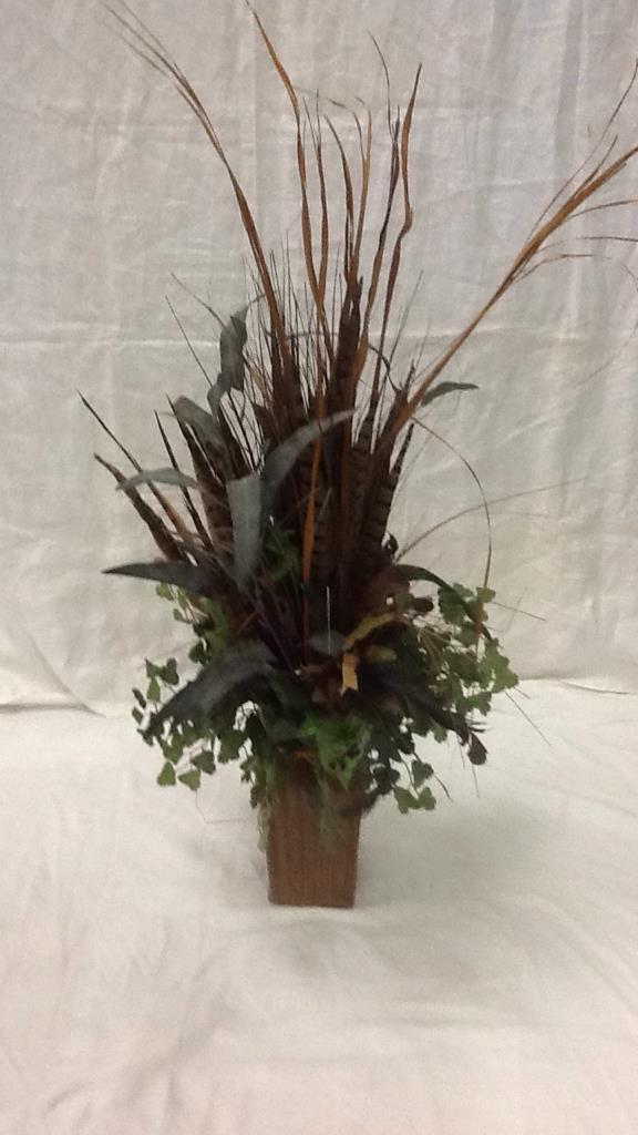 Floral Arrangement with Feathers and Greenery