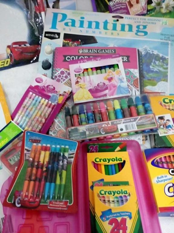 LOT OF COLORING BOOKS AND CRAYONS