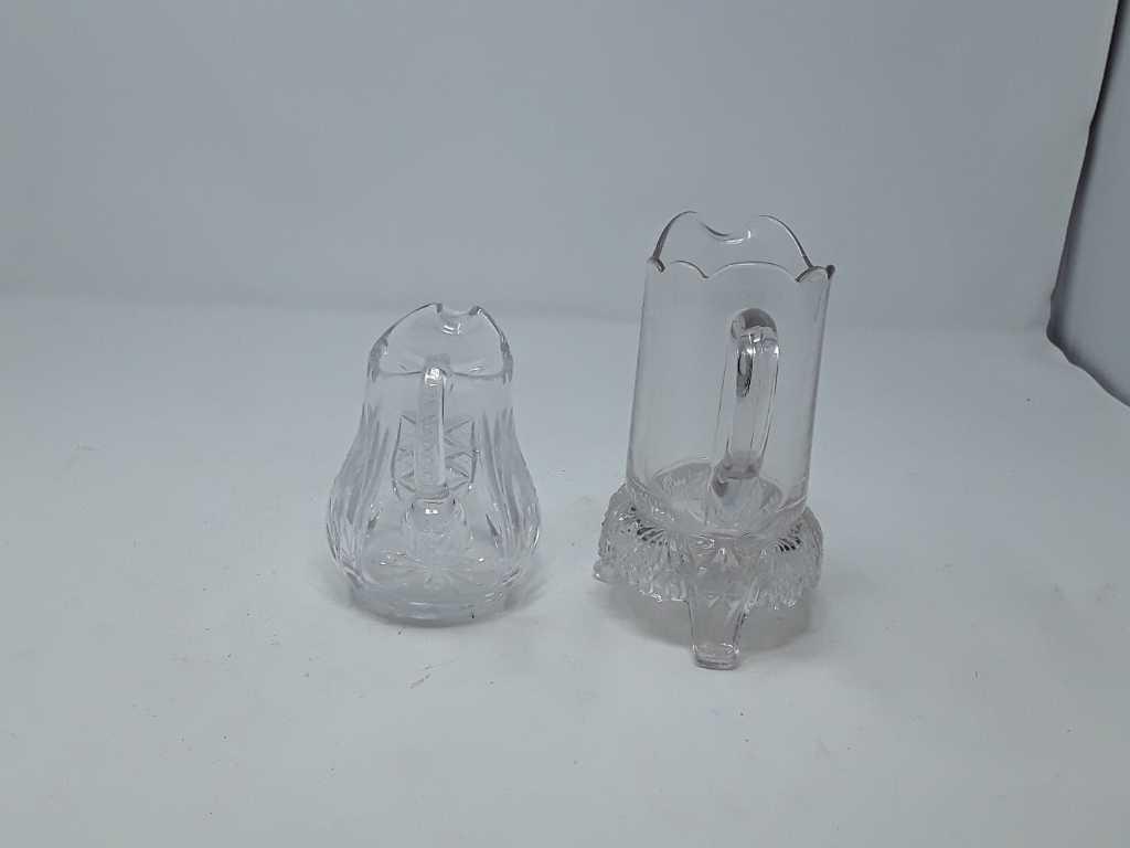 2 CUT GLASS SMALL PITCHERS 1-FOOTED BOTTOM