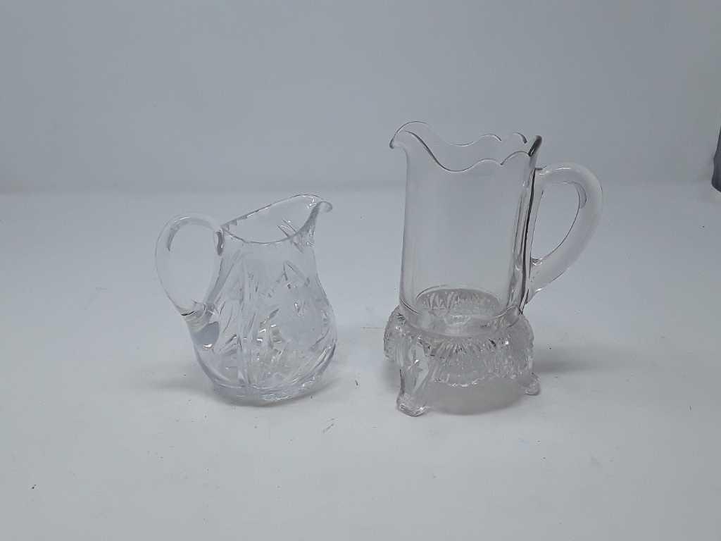 2 CUT GLASS SMALL PITCHERS 1-FOOTED BOTTOM