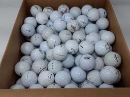 BOX OF USED MIXED BRAND GOLF BALLS.