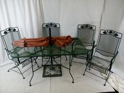 Green metal outdoor table umbrella and 4 chairs