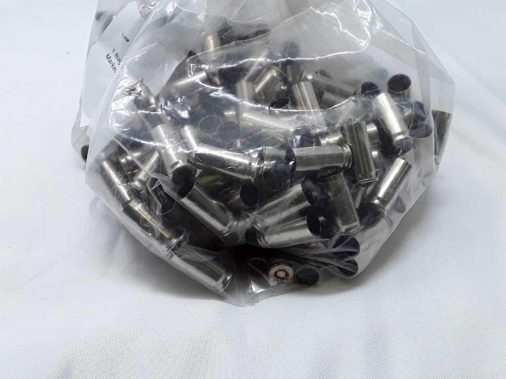 1 Bag of 38 Auto Nickled Casings.