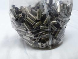 1 Bag of 38 Auto Nickled Casings.