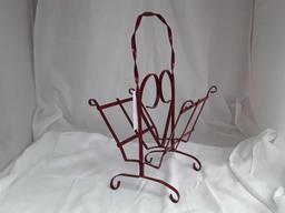 VINTAGE RED METAL MAGAZINE RACK WITH HANDLE