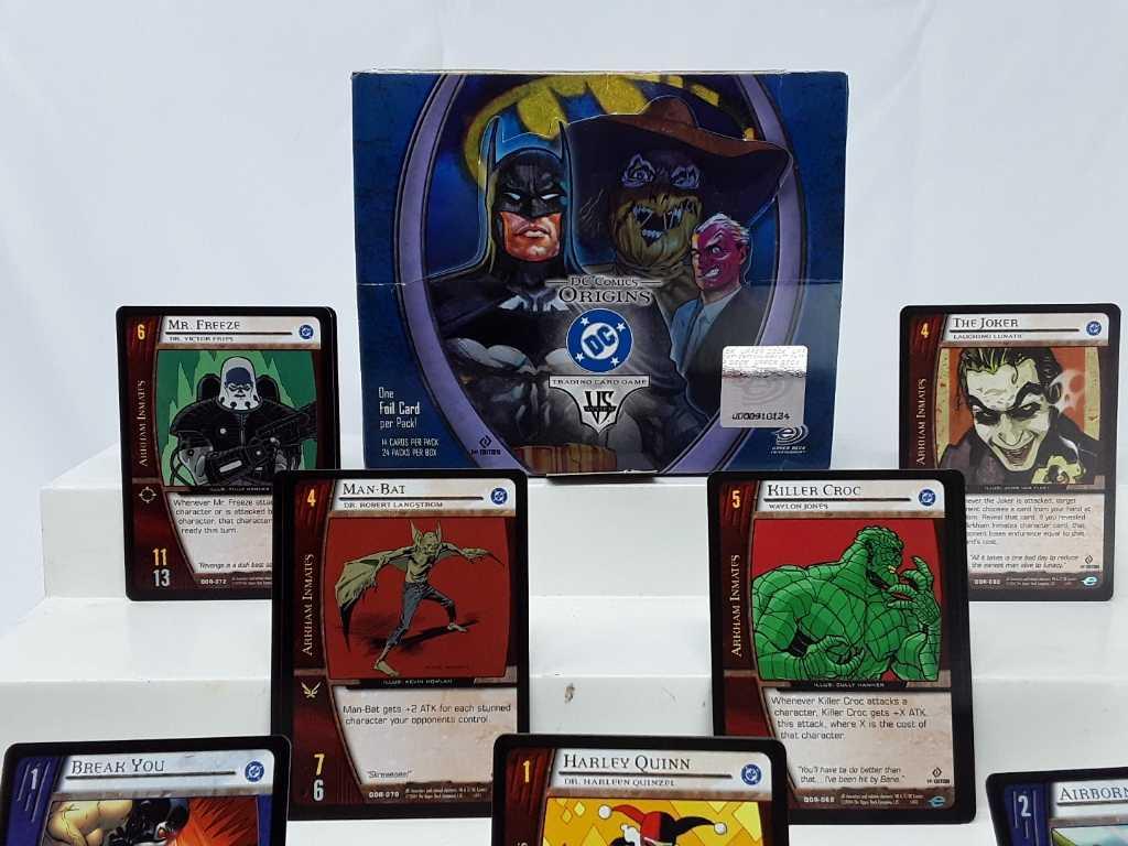 DC COMICS ORIGINS VS. TRADING CARDS