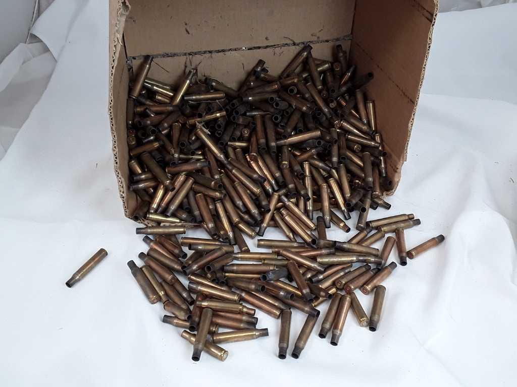 1 LARGE BOX OF PRIMED MISC UNKNOWN CALIBER CASINGS