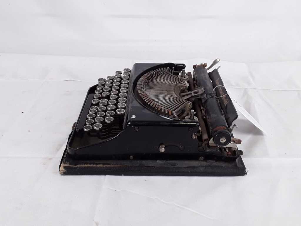 Antique Remie Scout Model Typewriter.