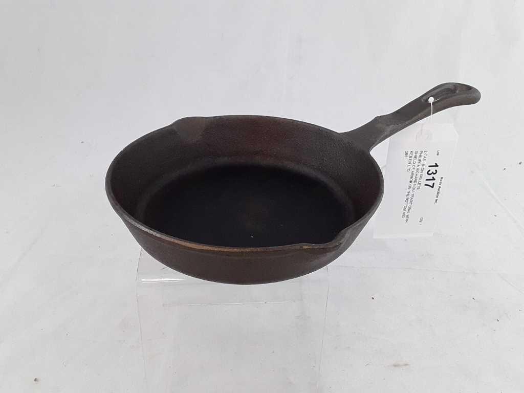 2 CAST IRON SKILLETS,