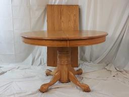 WOODEN ROUND TABLE W/LEAF CARVED FEET