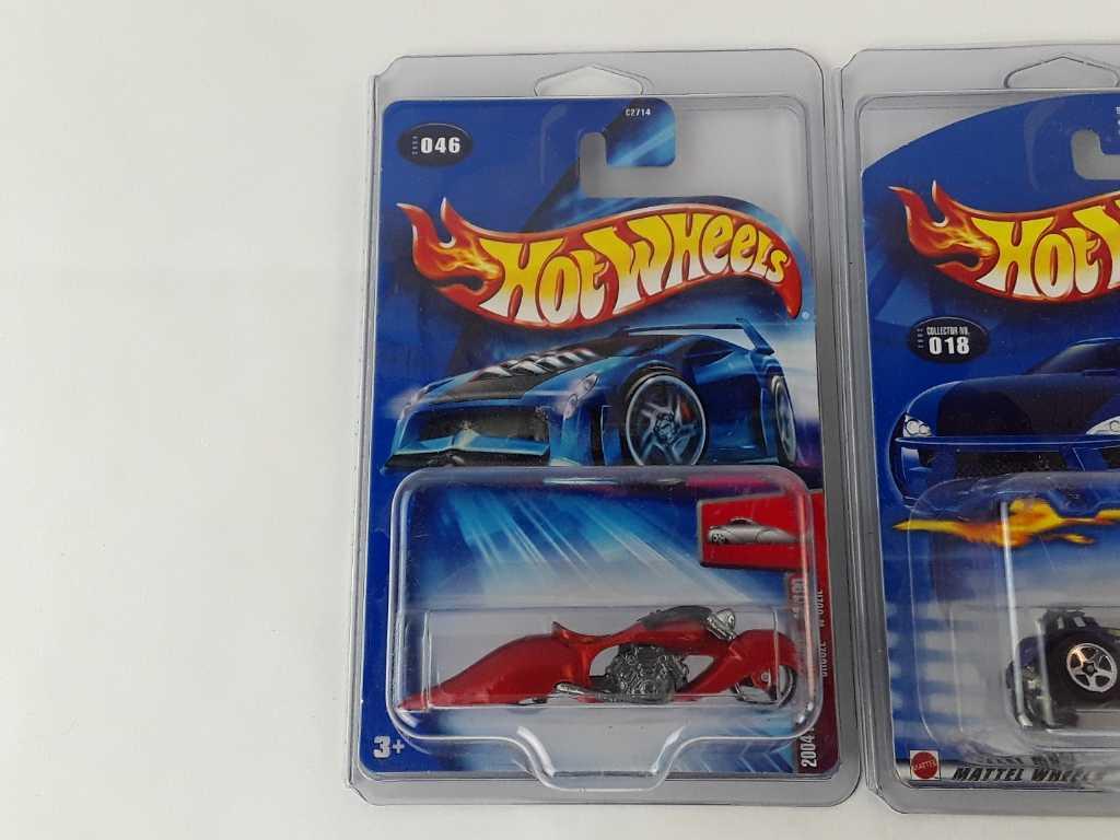 3 HOT WHEELS NEW IN PACKAGE W/HARD CASES