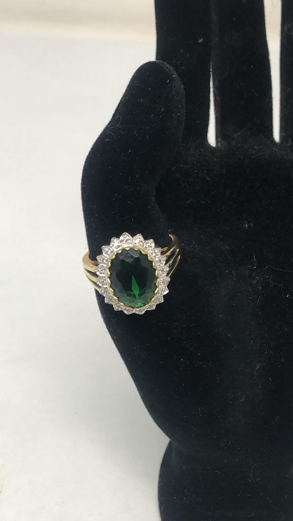 GOLD TONE OVAL CUT GREEN STONE RING