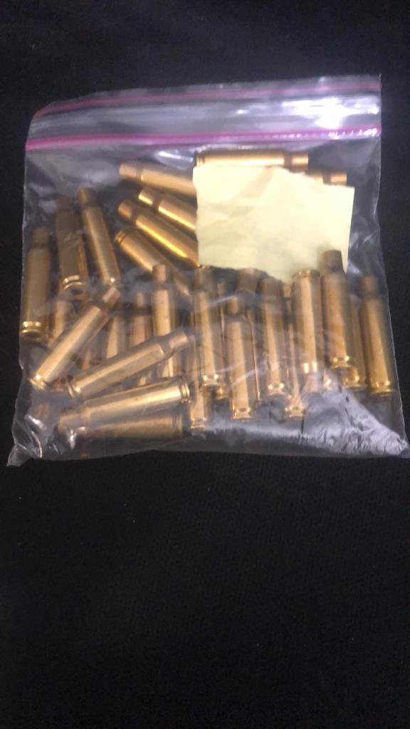 MILITARY AMMO CASEOF 308 CALIBER BRASS CASEINGS.