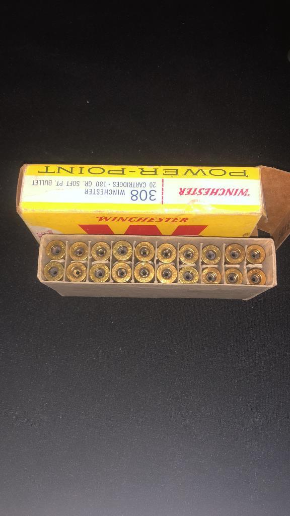 MILITARY AMMO CASEOF 308 CALIBER BRASS CASEINGS.