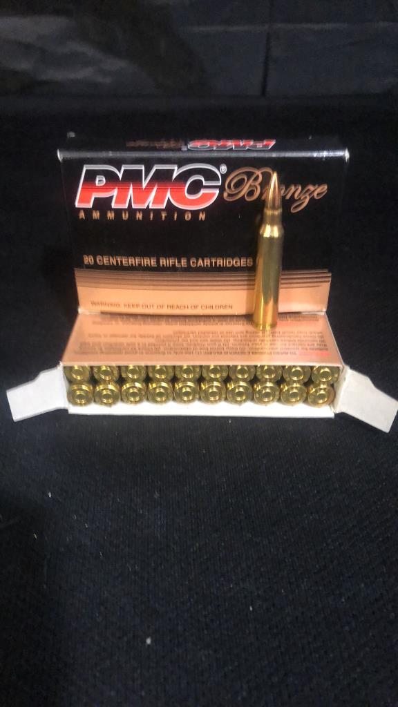 2 BOXES OF PMC BRONZE 223 REMINGTON AMMO.