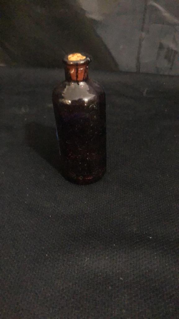 5 CAPPED GLASS BOTTLES