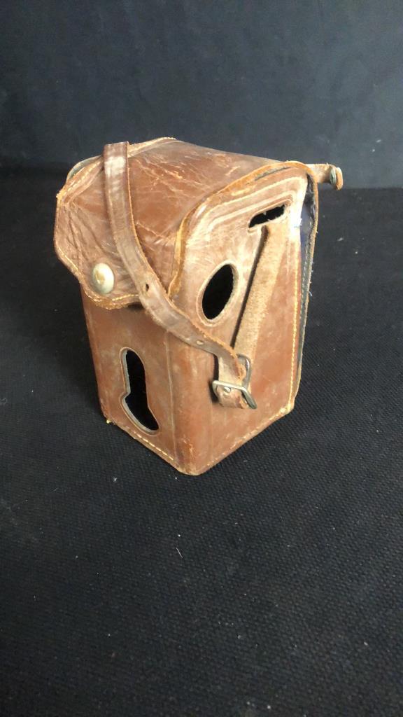 FIVE VINTAGE LEATHER STANDING CAMERA CASES