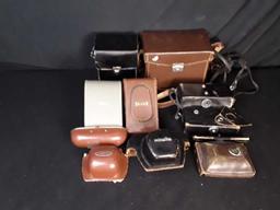 SET OF VINTAGE LEATHER CAMERA CASES