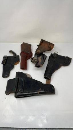 5) LEATHER HOLSTERS.