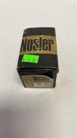 1 BOX OF NOSLER 338 CALIBER BULLETS.