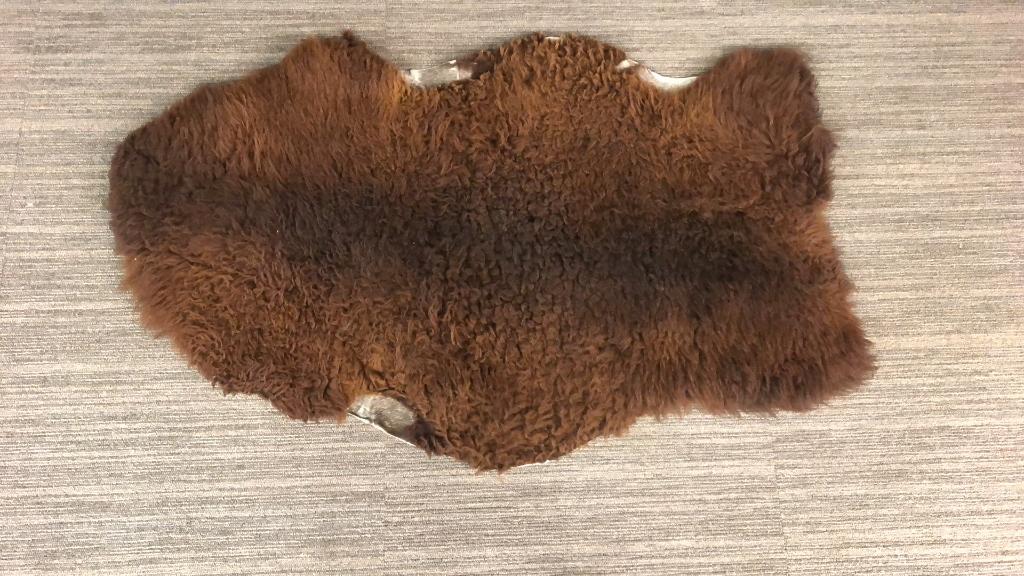 BROWN FUR RUG