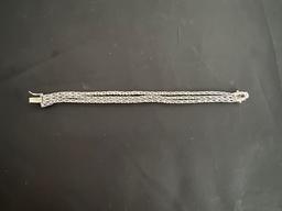 STERLING SILVER 3 STRAND BRACELET. 22G