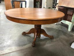 Antique Round Oak Table w/ Claw Feet and Six Leaves, 29" t, 55" w
