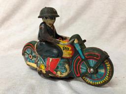 Tin Police Officer Toy