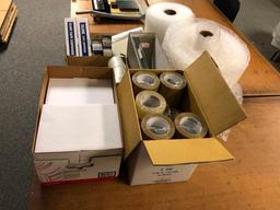 9 Reams of Letter Size Paper, Several Rolls Packing Tape, Bubble Wrap, Tape Guns, Scale