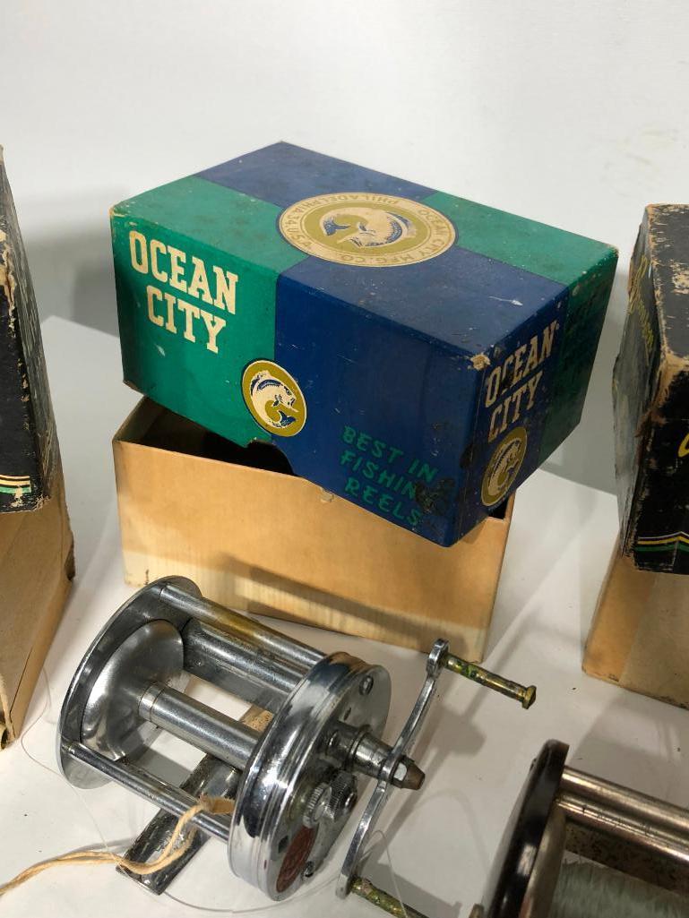 Lot of 4 Bait Casting Fishing Reels w/ 2-Part Boxes, Bronson and Ocean City
