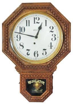 Ingraham oak school house regulator clock, embossed octagonal case w/Egg & Dart molding, c.1910