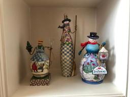 Three Shelves of Jim Shore Christmas Collectibles