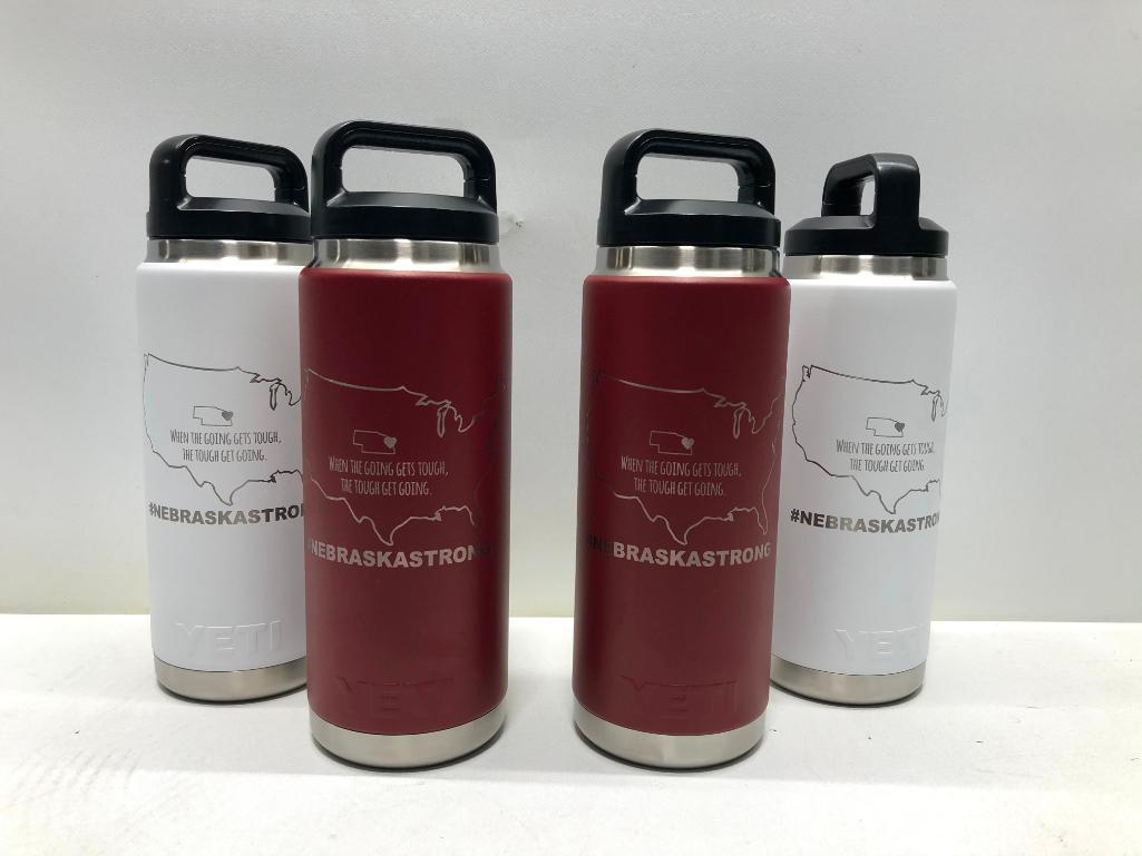 Lot of 4- 2 White Nebraska Strong 26oz Yeti Rambler Bottles, 2 Red Nebraska Strong 26oz Yeti Rambler