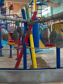 Water Park Decoration, Painted Wooden Poles and Faux Coconuts, Some Coconuts w/ Tribal Faces