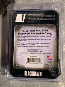 Holsters; Sneaky Pete and Blackhawk