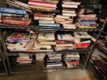 Assorted Books on Bottle Three Shelves