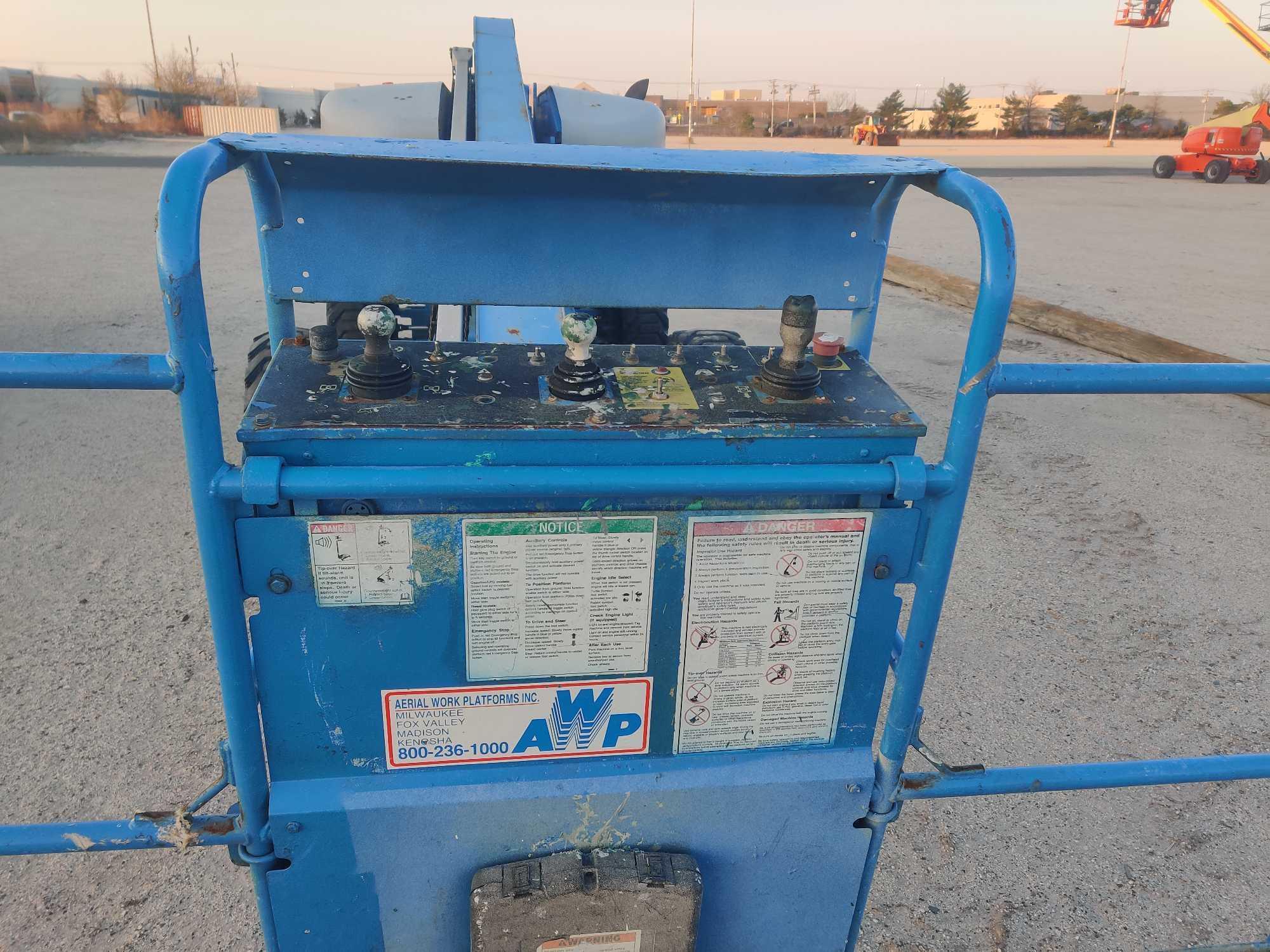 GENIE S60 BOOM LIFT SN:60049960 4x4, powered by diesel engine, equipped with 60ft. Platform height,