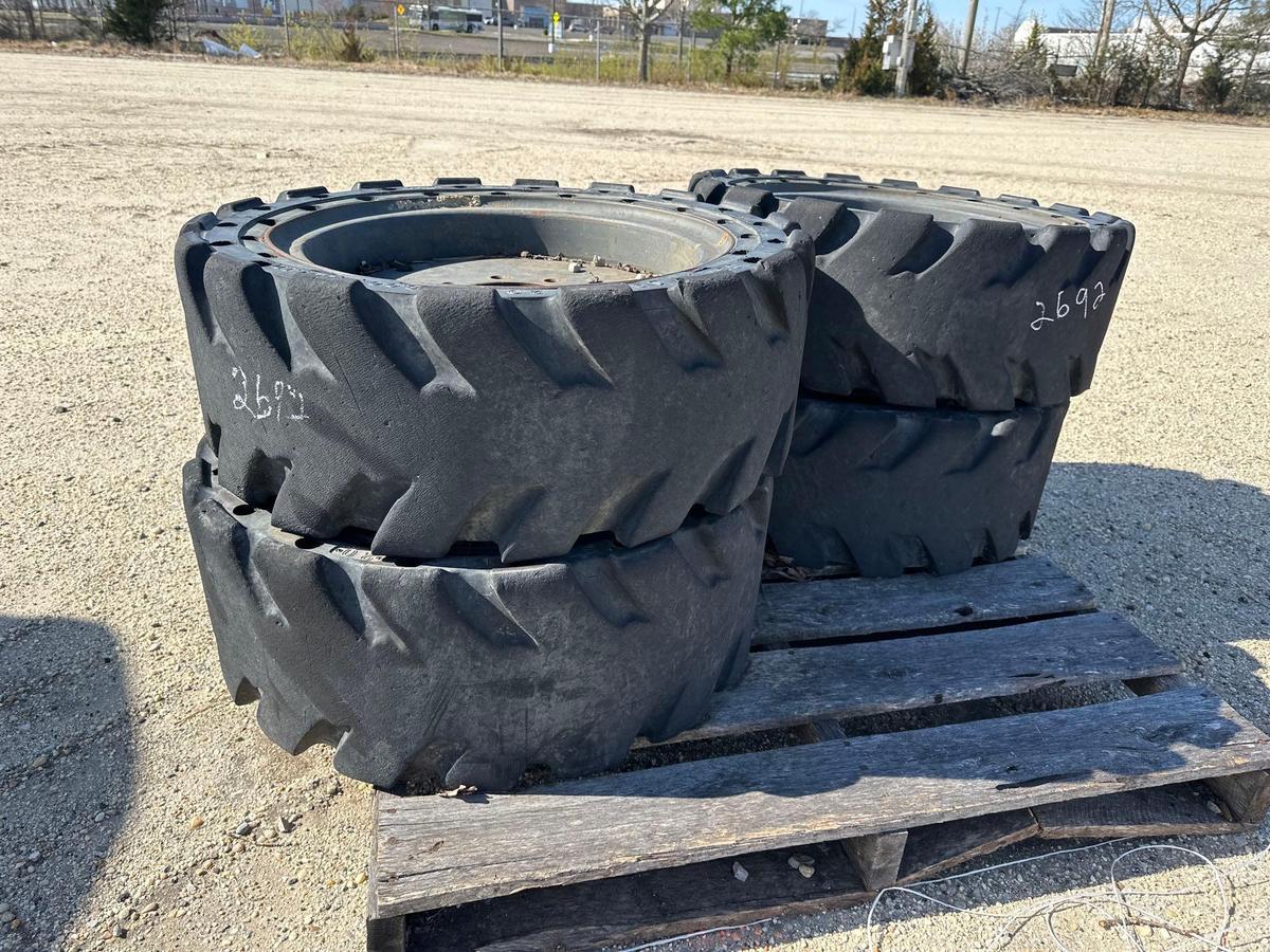 KUBOTA SET OF 4 8 LUG FLAT FREE SKID STEER TIRES SKID STEER ATTACHMENT SN:900526