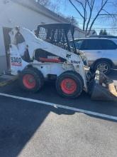 BOBCAT S300 SKID STEER SN:525813254 powered by diesel engine, equipped with rollcage, auxiliary