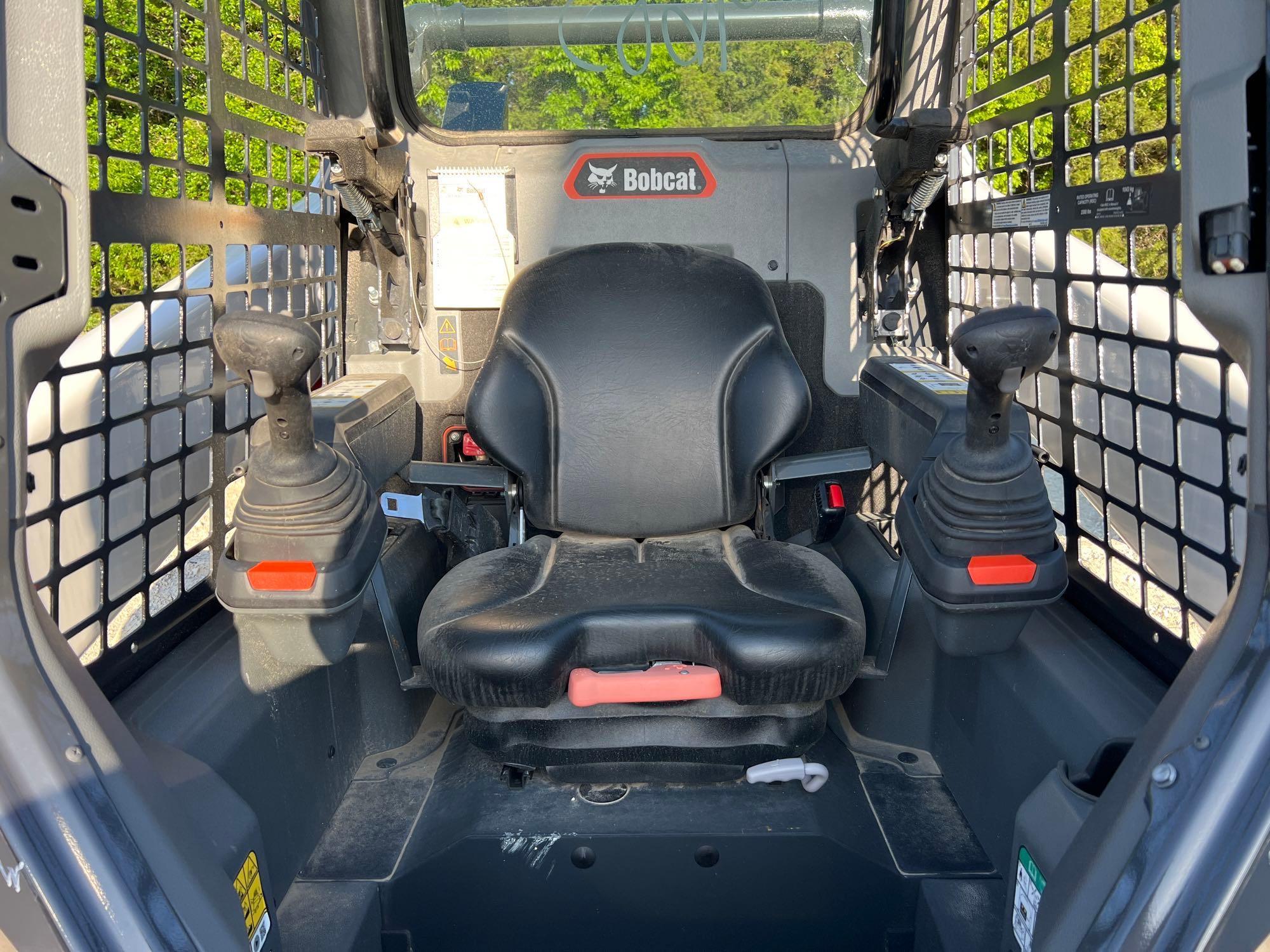 2023 BOBCAT T64 RUBBER TRACKED SKID STEER powered by diesel engine, equipped with rollcage,