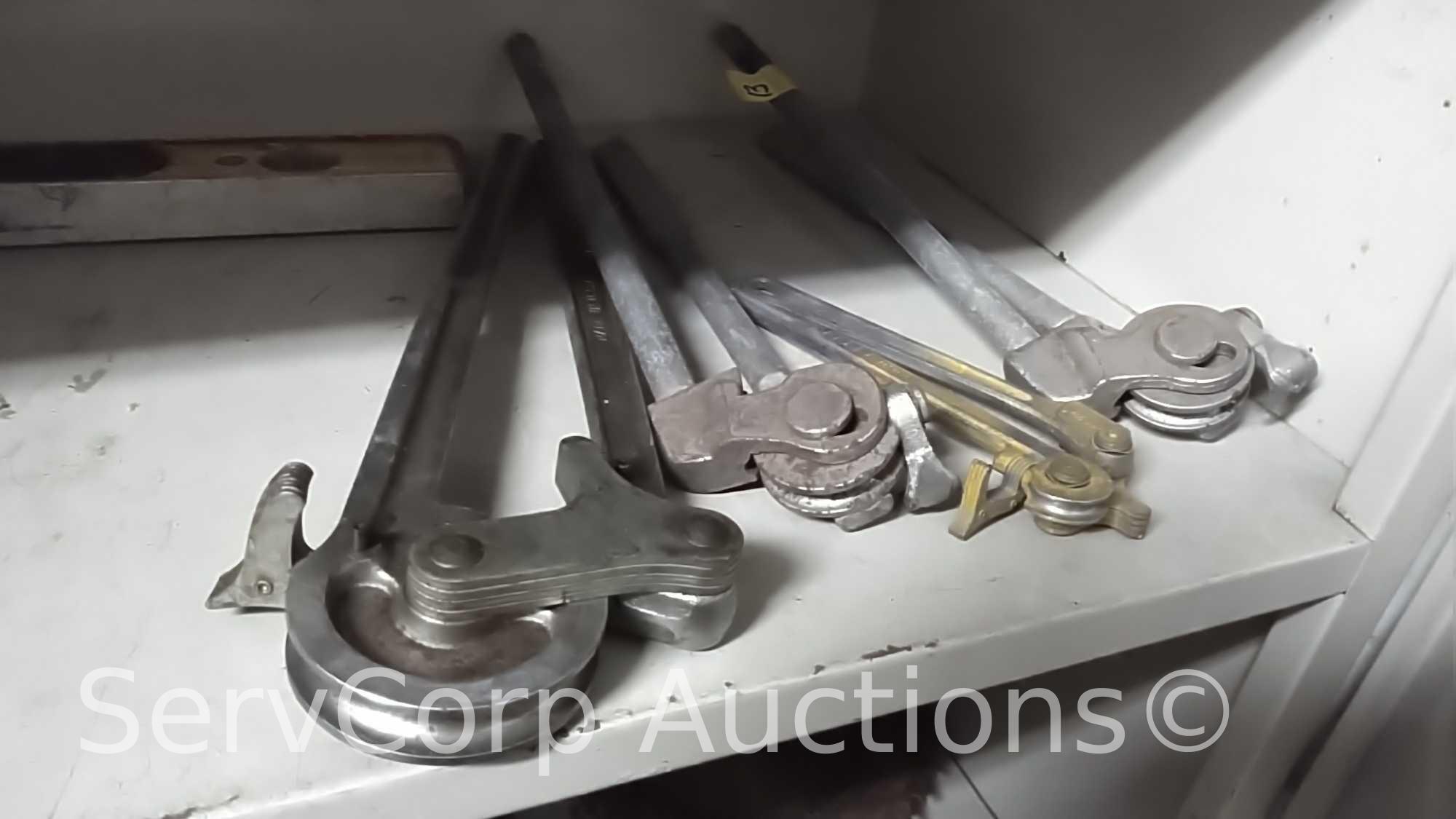 Lot on 3 Shelves: Saw Blades, Grinding Wheels, Small Pipe Benders, Wheel Barrow Tire, Kneed Pads,