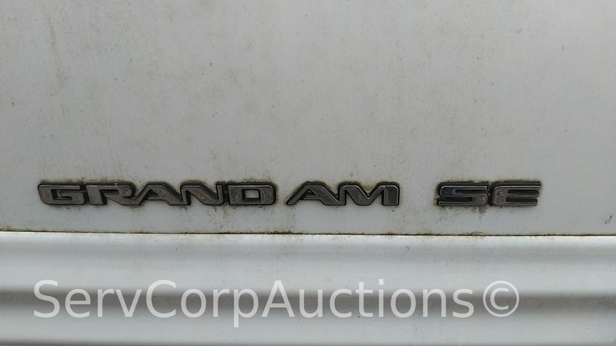 1999 Pontiac Grand Am Passenger Car, VIN # 1G2NE52E5XM725551, Salvage