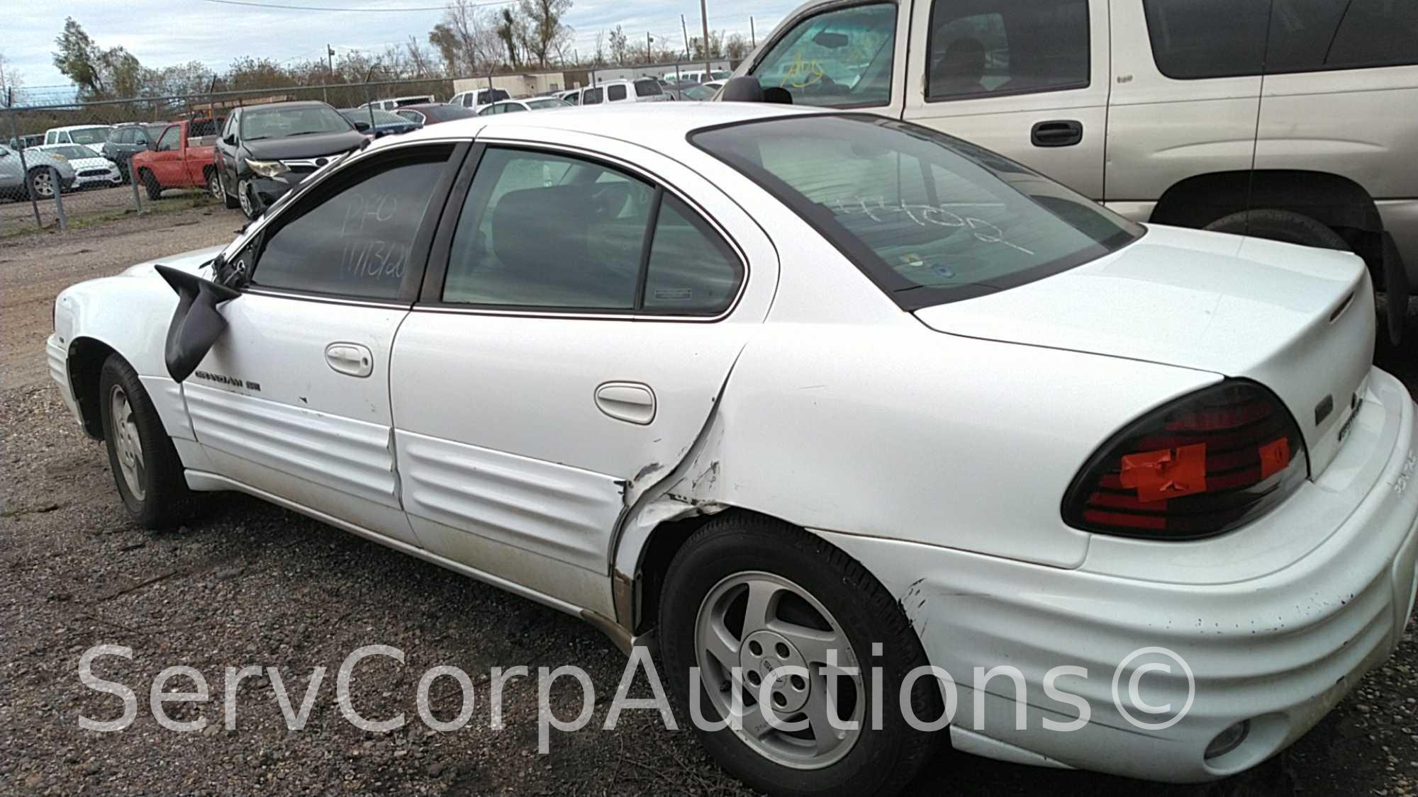 1999 Pontiac Grand Am Passenger Car, VIN # 1G2NE52E5XM725551, Salvage