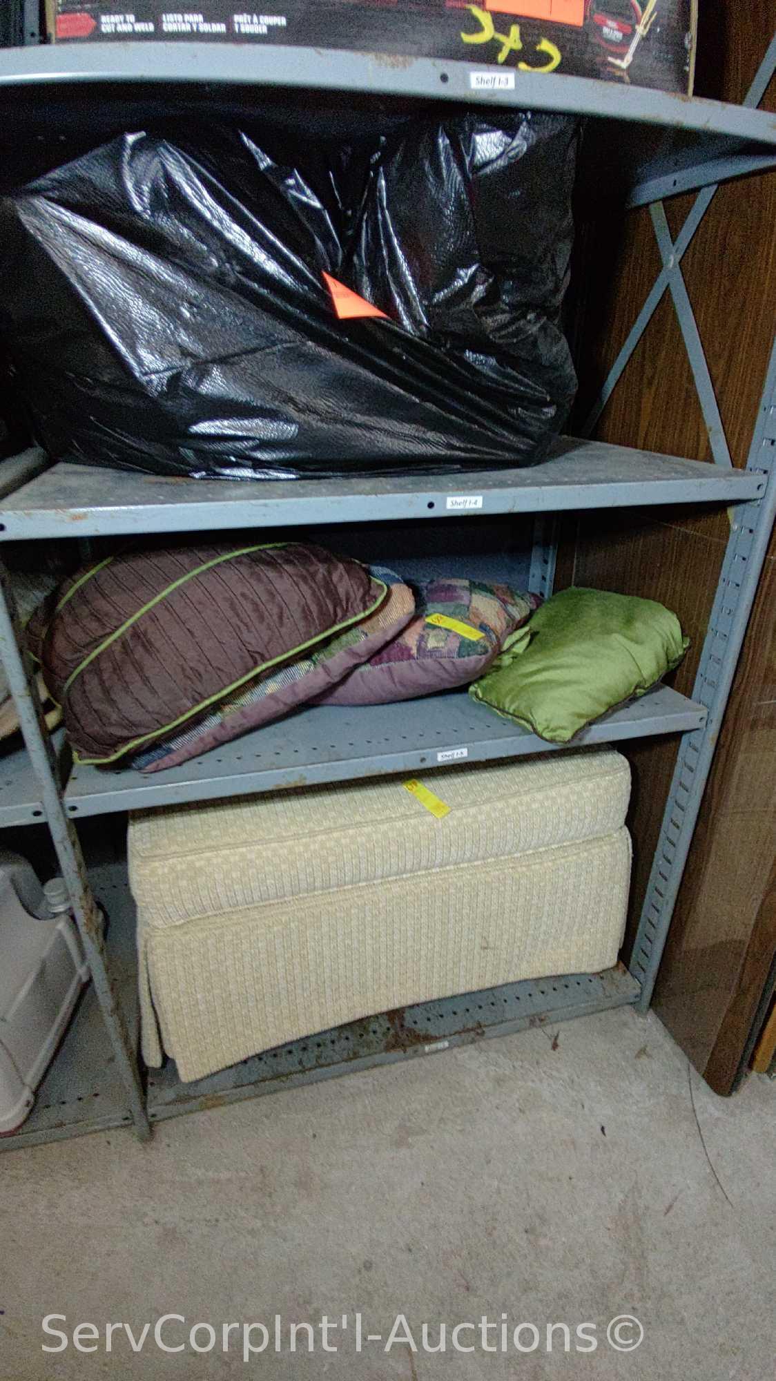 Lot on Shelf of Gold Fabric Ottoman Footstool with one Broken Leg and Various Throw Pillows